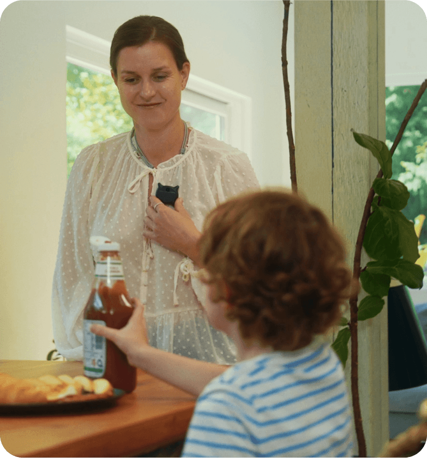 Woman wearing Looki device with thoughtful expression